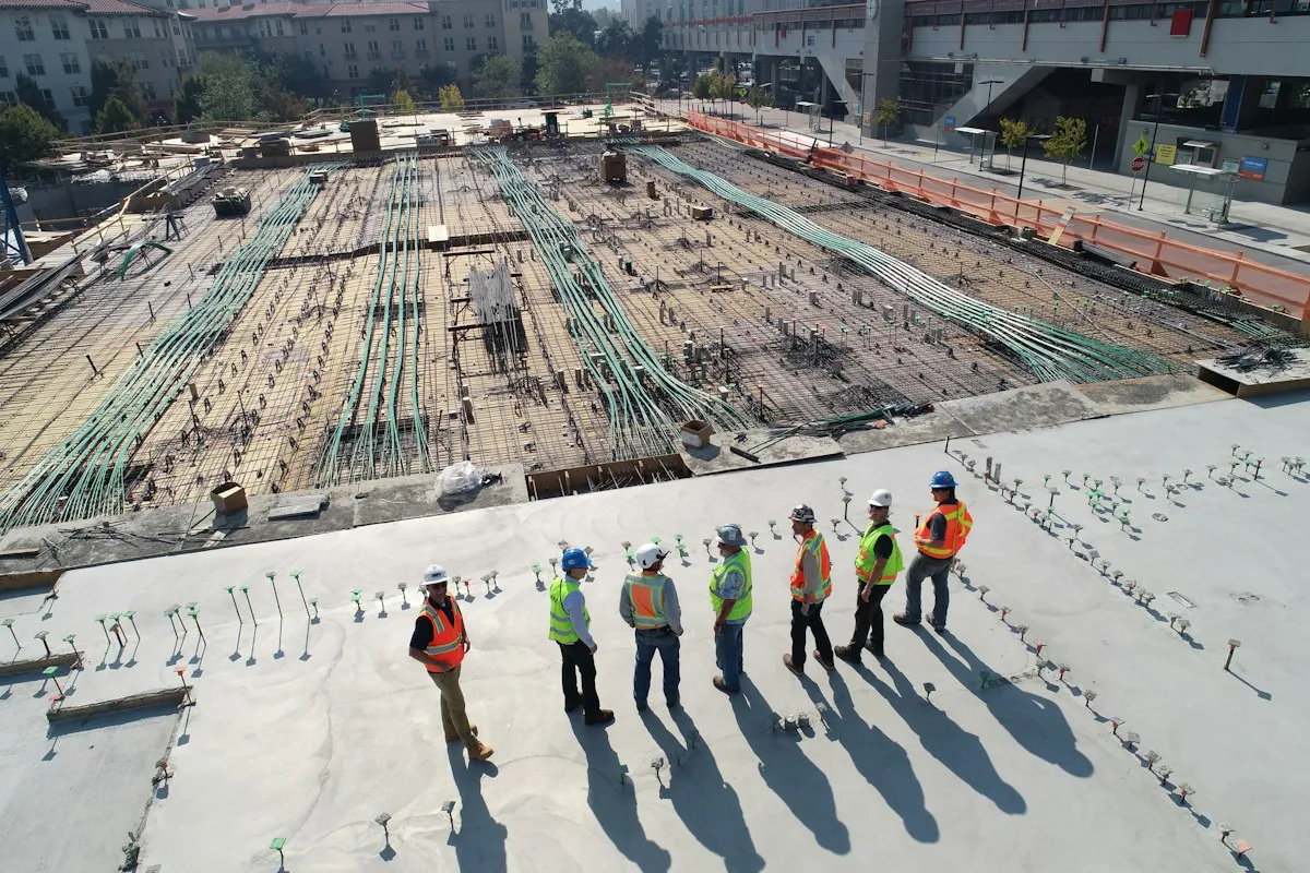 Construction worker using tablet representing construction software integration